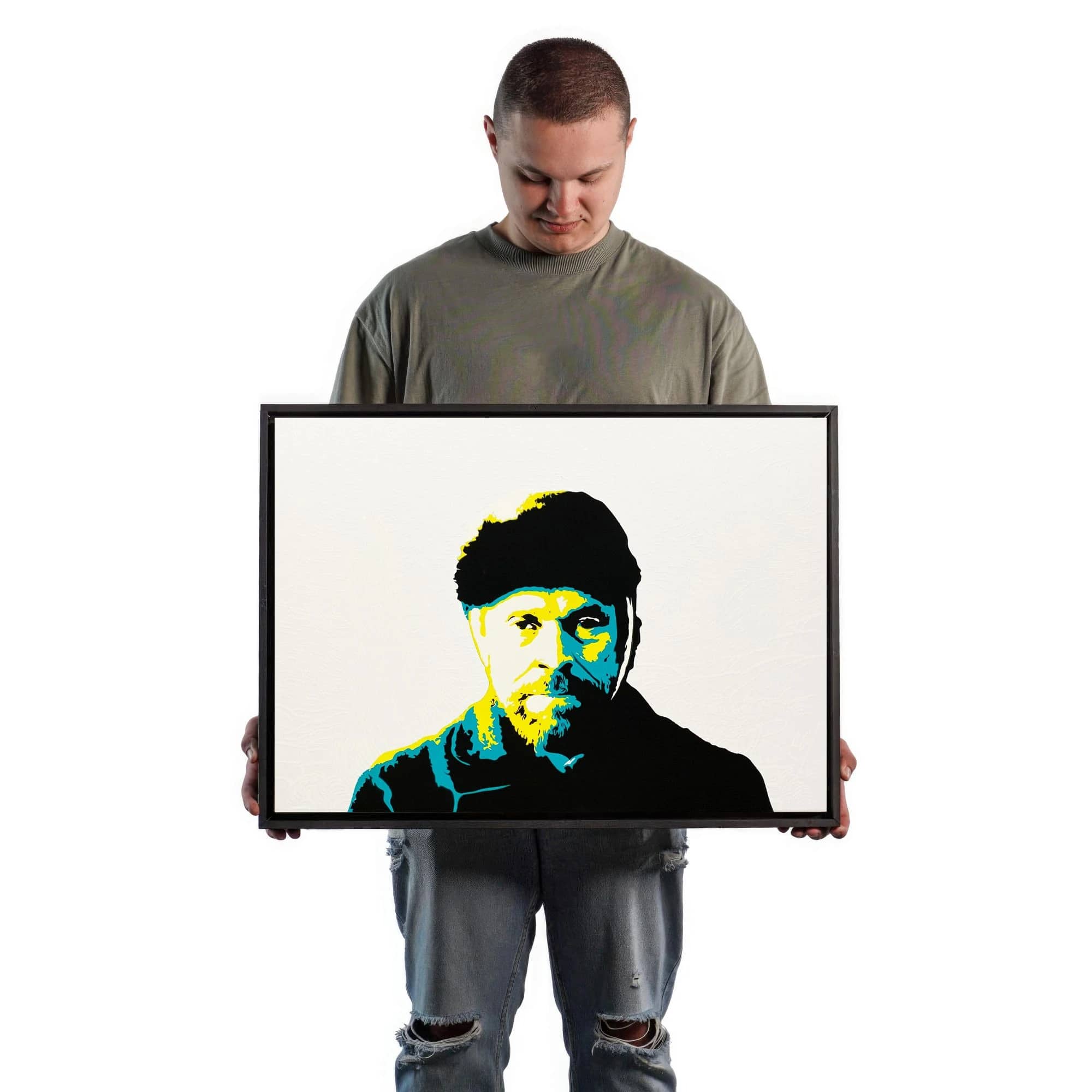 Artist holding portraits of Vincent Van Gogh: on the left, a 50x70 centimeter stencil art. The picture is being used as a size reference, comparing it to the size of a real human body.